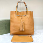 Gucci GG Canvas Tassel Bucket Bag Beige Gold Hardware