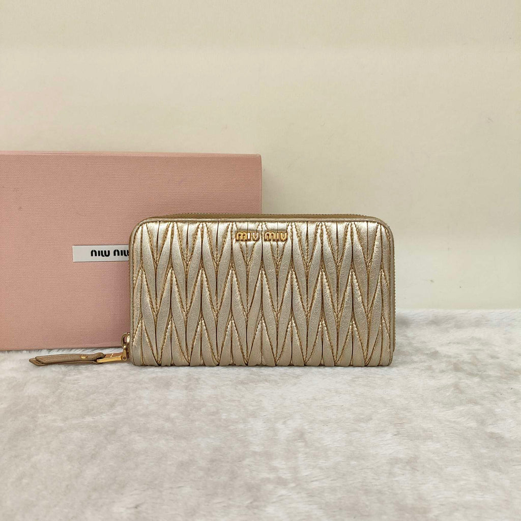 Miu Miu Matelassé Zip-Around Wallet Metallic Champagne Gold Leather Gold Hardware