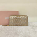 Miu Miu Matelassé Zip-Around Wallet Metallic Champagne Gold Leather Gold Hardware