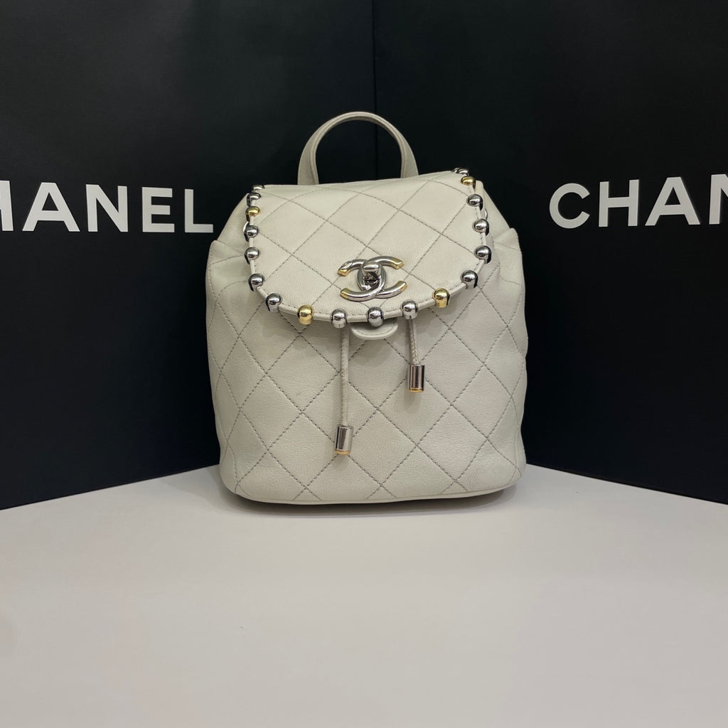 Chanel CC Day Backpack White Quilted Leather Bicolor Studs Gold Hardware