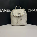 Chanel CC Day Backpack White Quilted Leather Bicolor Studs Gold Hardware