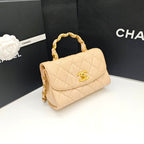 Chanel Classic Top Handle Handbag Beige Quilted Leather Gold Hardware