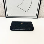 Chanel Classic Pouch Black Quilted Leather Gold Hardware