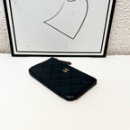 Chanel Classic Pouch Black Quilted Leather Gold Hardware