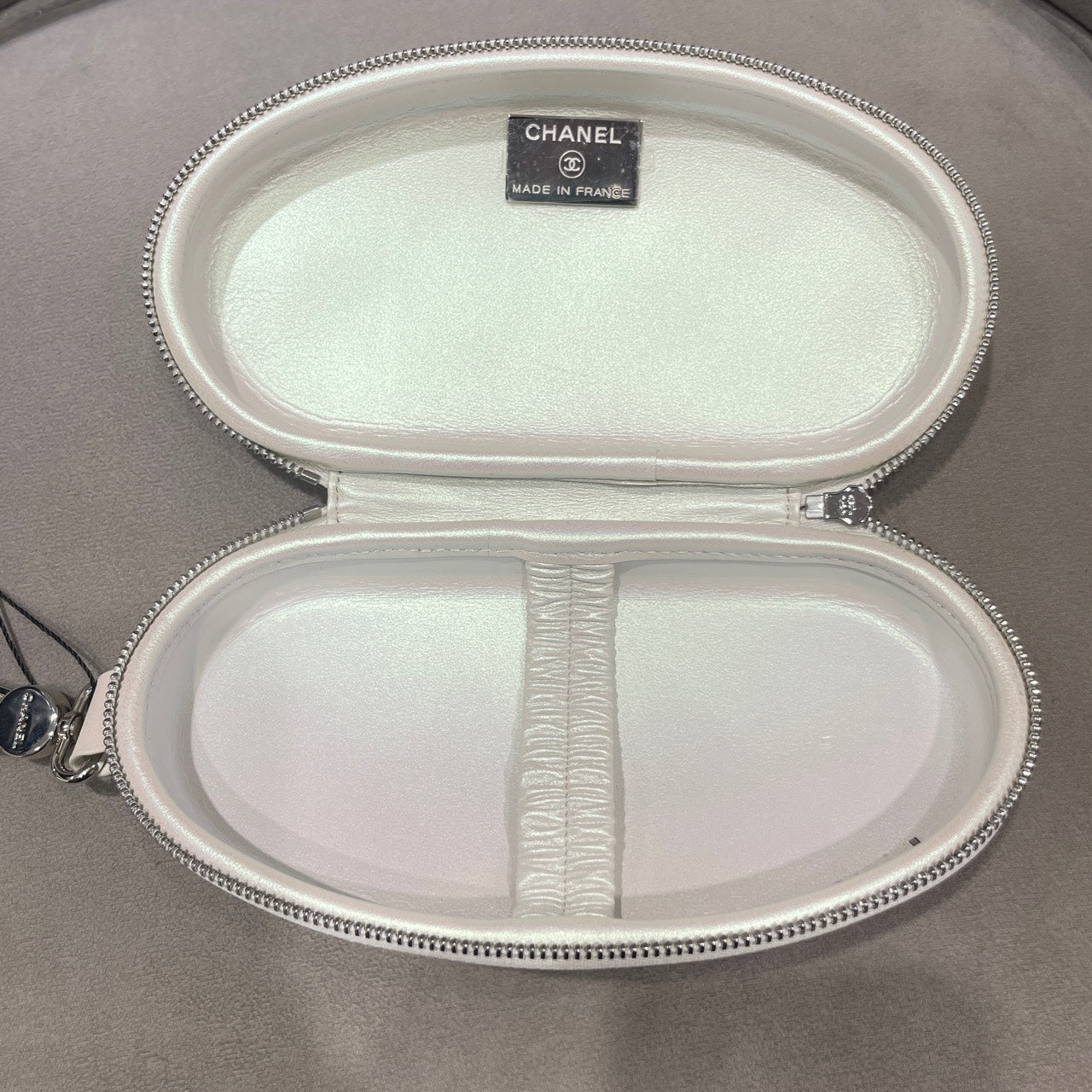 Chanel Quilted Pearlescent Leather Oval Pouch Silver Hardware