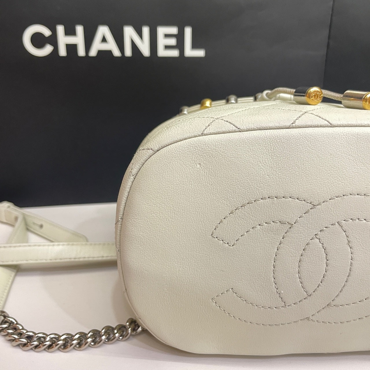 Chanel CC Day Backpack White Quilted Leather Bicolor Studs Gold Hardware