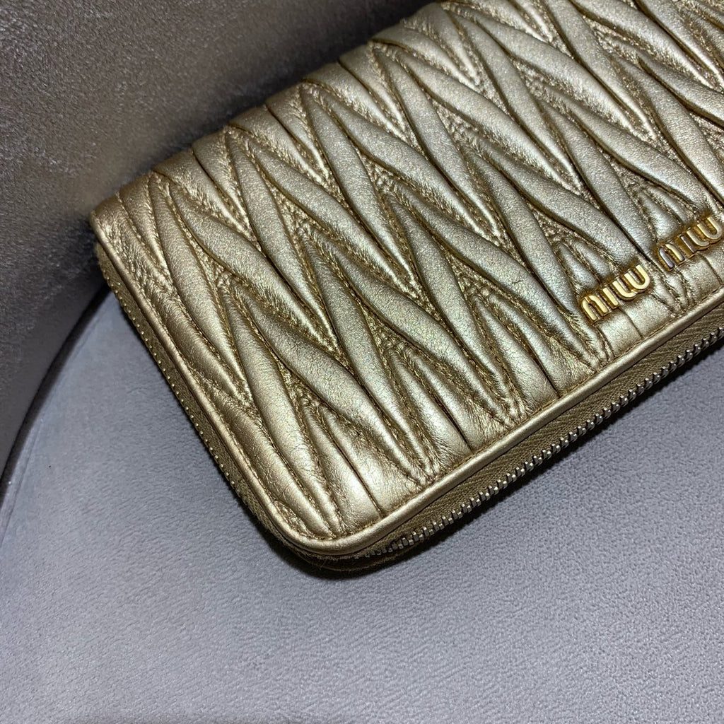 Miu Miu Matelassé Zip-Around Wallet Metallic Champagne Gold Leather Gold Hardware