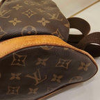 Louis Vuitton Monogram Bosphore Backpack Brown Gold Hardware