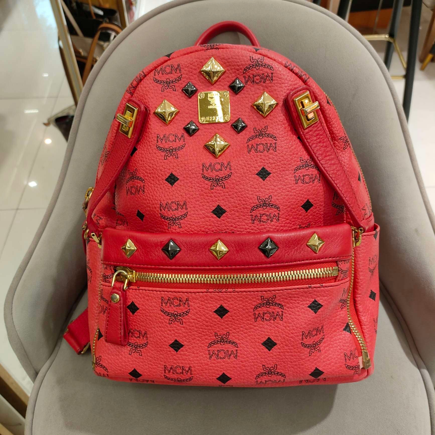 MCM Visetos Rivet Stark Backpack Medium Watermelon Red Gold Hardware