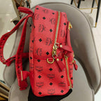 MCM Visetos Rivet Stark Backpack Medium Watermelon Red Gold Hardware