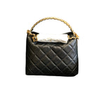 CHANEL Clutch with Chain | Pebbled Patent Calfskin | Gold Hardware