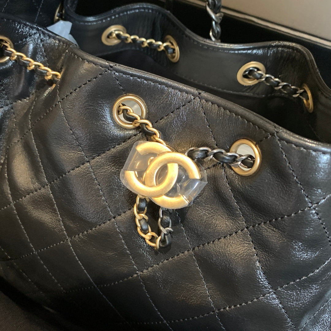CHANEL 25 Small Handbag | Glossy Pebbled Calfskin | Dual-Tone Hardware