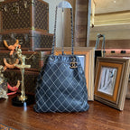 Chanel Drawstring Tote Bag Black Quilted Leather Gold Hardware