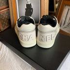 Chanel Low-top Sneakers Off-White Leather Black Laces