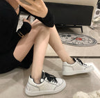 Chanel Low-top Sneakers Off-White Leather Black Laces